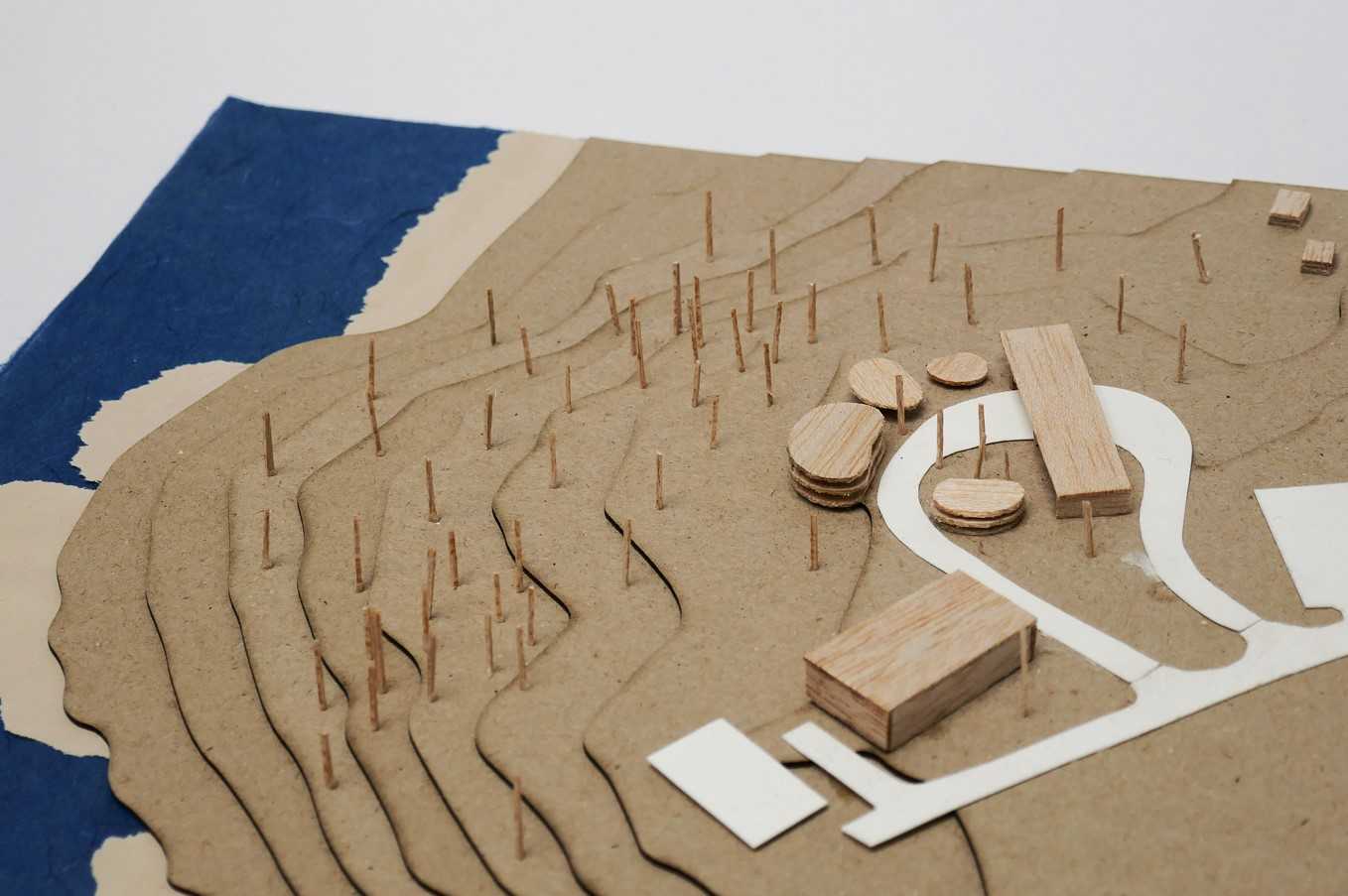 This model shows the building forms sited amongst the trees, their repetitive trunks translated into the design. It also provides context for the area in which the Gamay Rangers work.