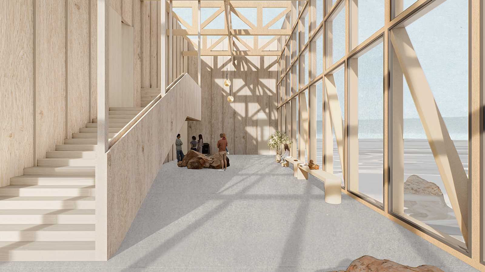 The internal public space outside the theatre room opens to stunning harbour views, with natural rocks extruding from the floor. This feature adds excitement and deepens the connection to nature.