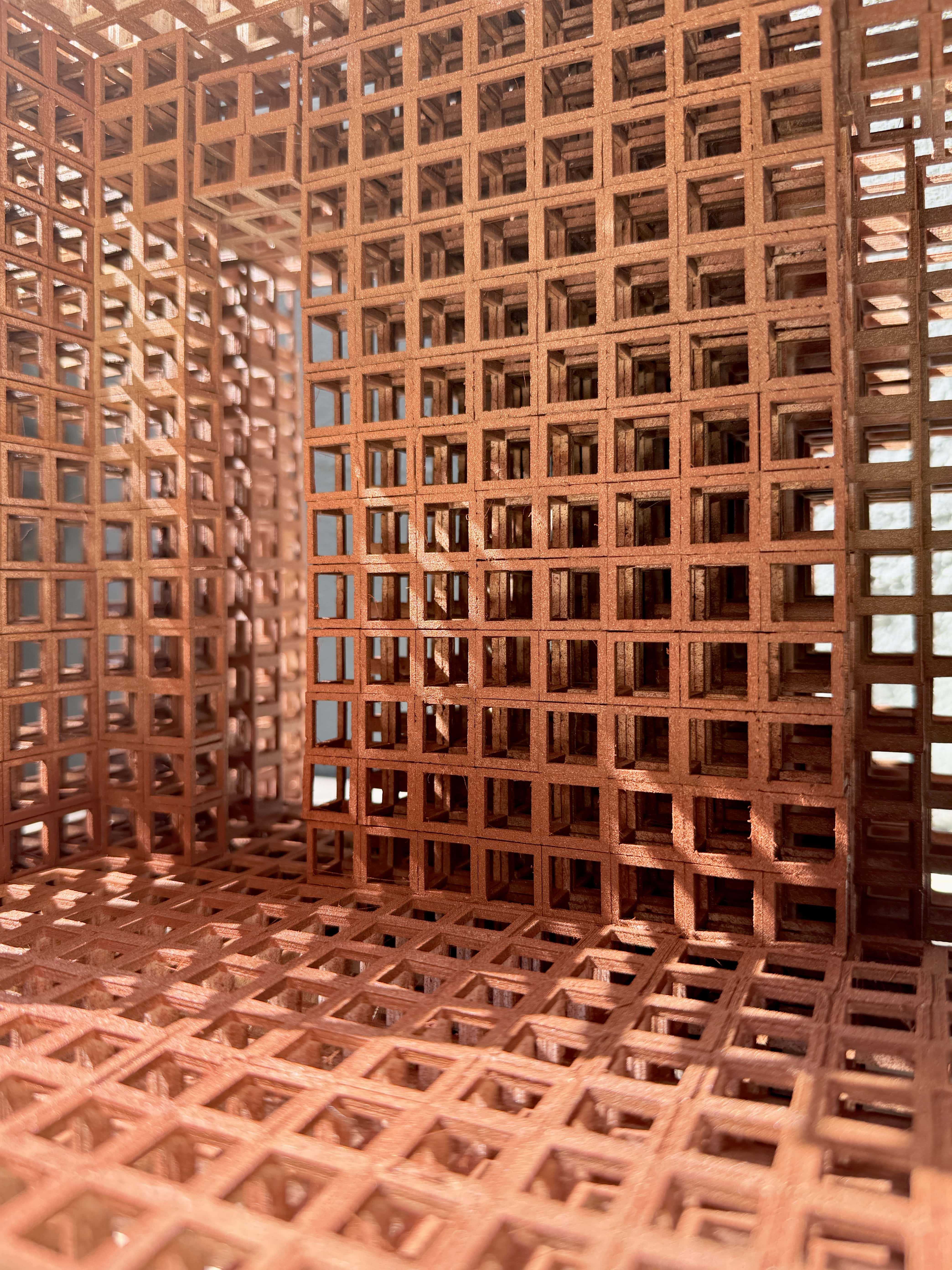 Embraced by timber cubes, this space evokes a quiet sense of awe and remembrance prompting one to reflect on what has been lost and what remains.