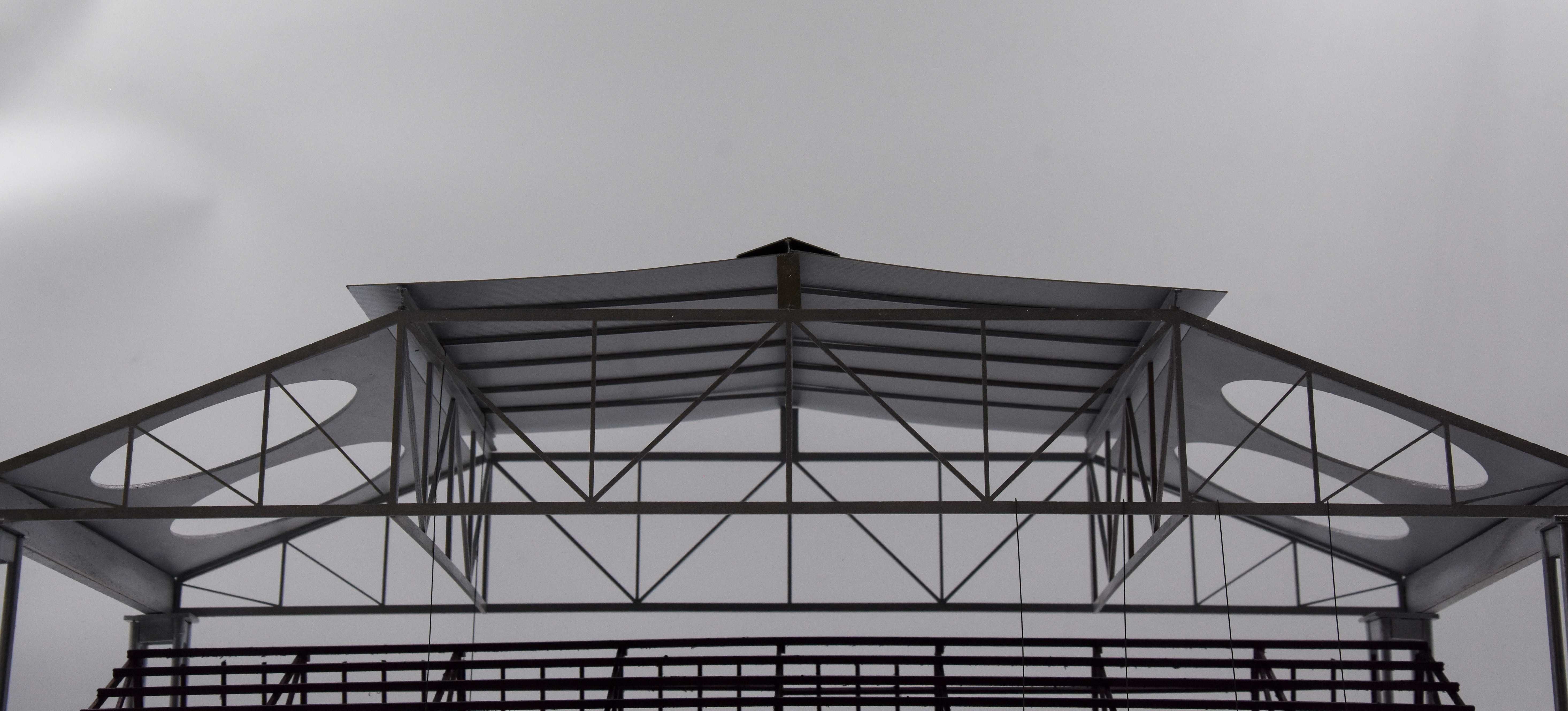 Physical model. A new structural system encloses the original trusswork of the Newtown Tram Depot without interference.