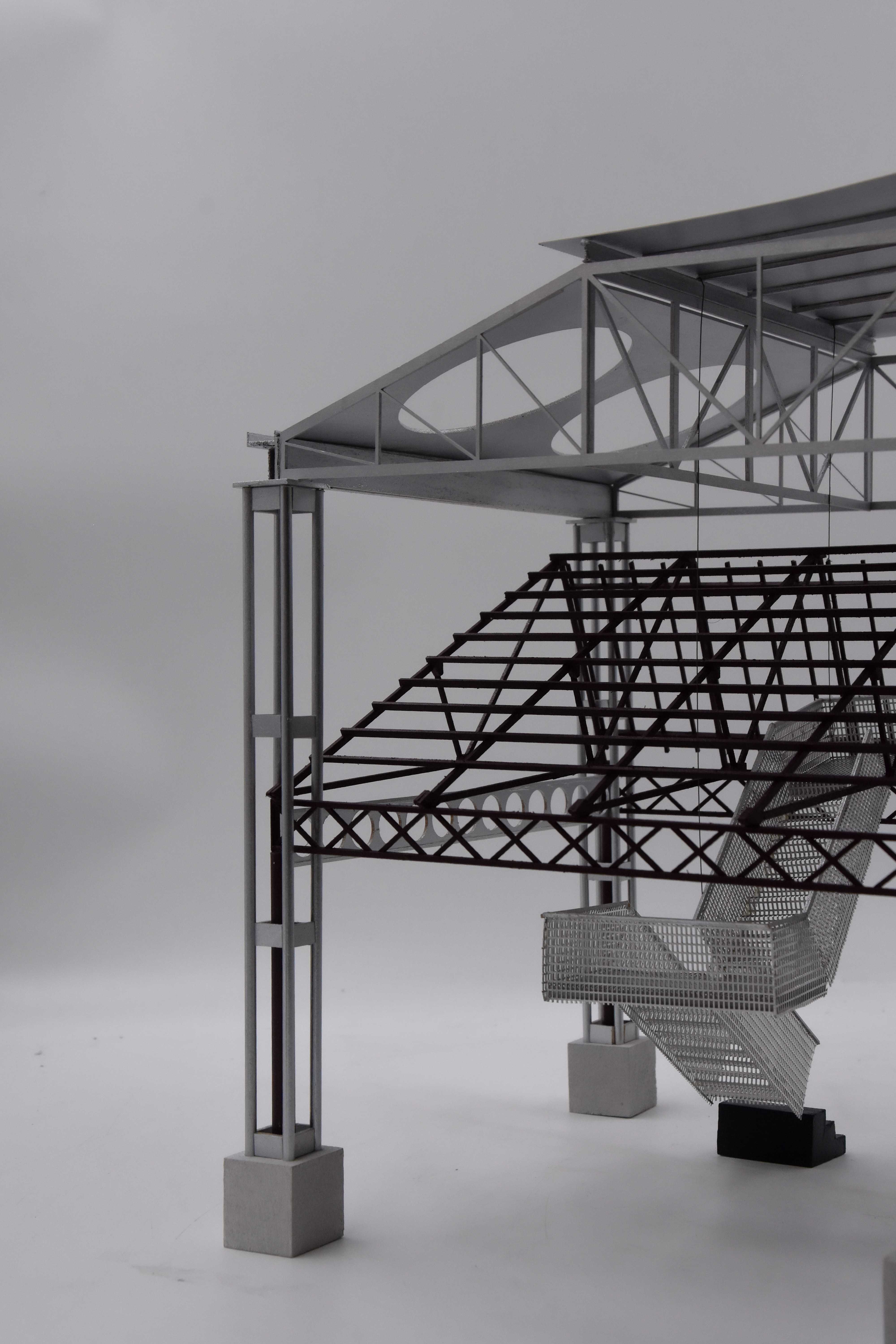 Physical model. A play on structure between old and new. Four new CHS columns envelop each existing column to support a new portal structure above.