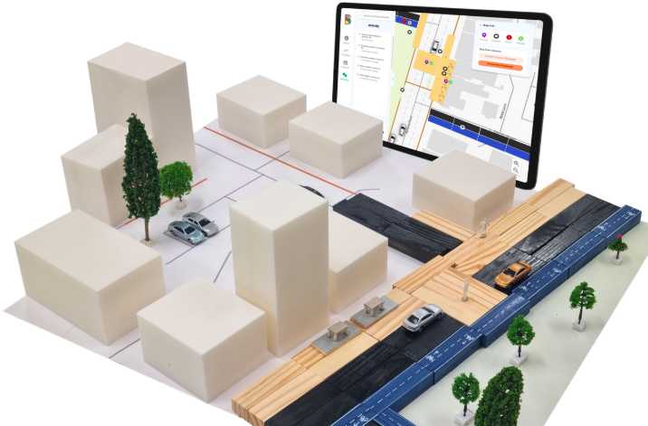 Our physical prototype alongside our linked digital interface