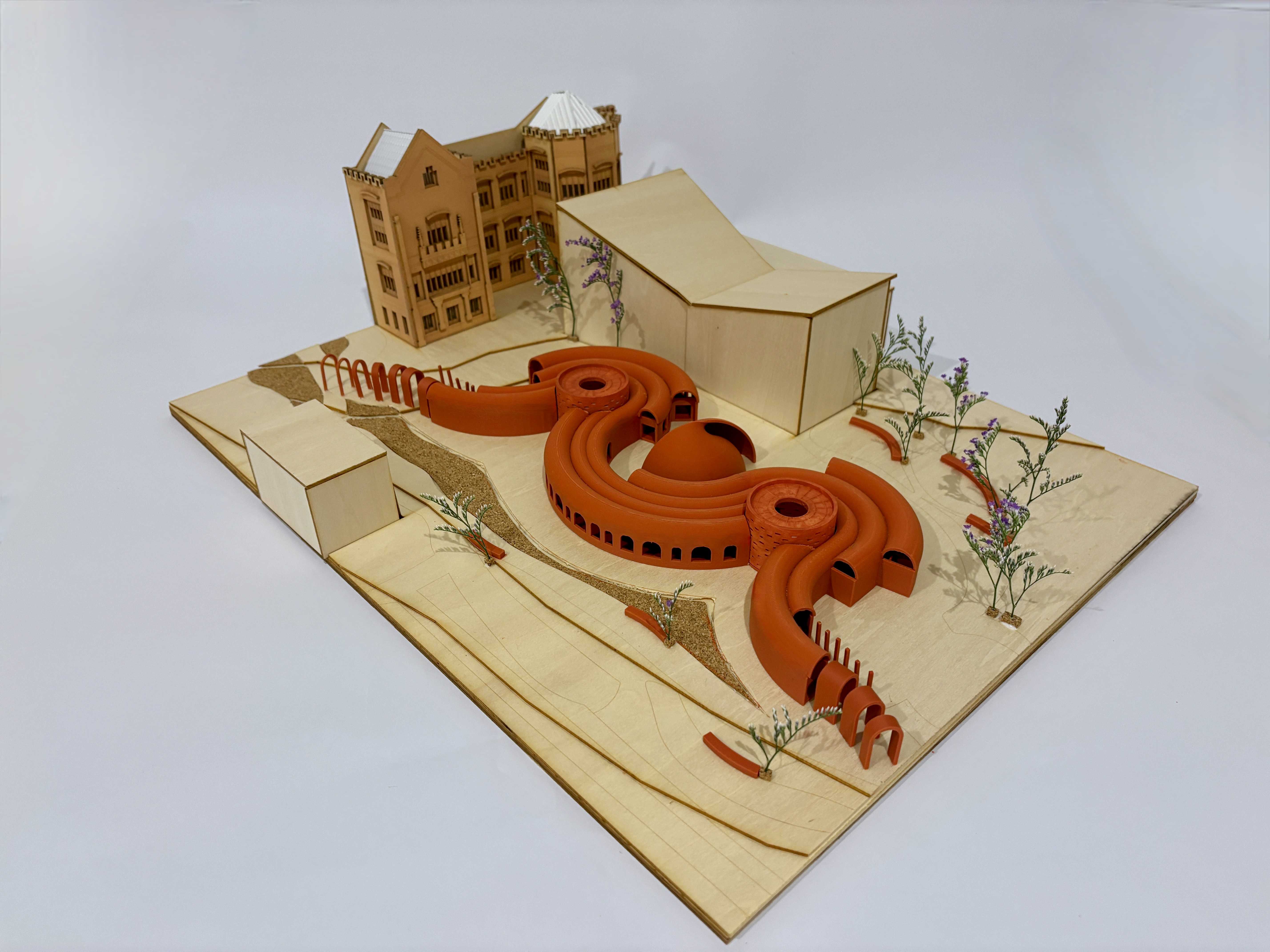 Model Photo - axo of Earthen Forms building and Southern facade of the Anderson Stuart Building
