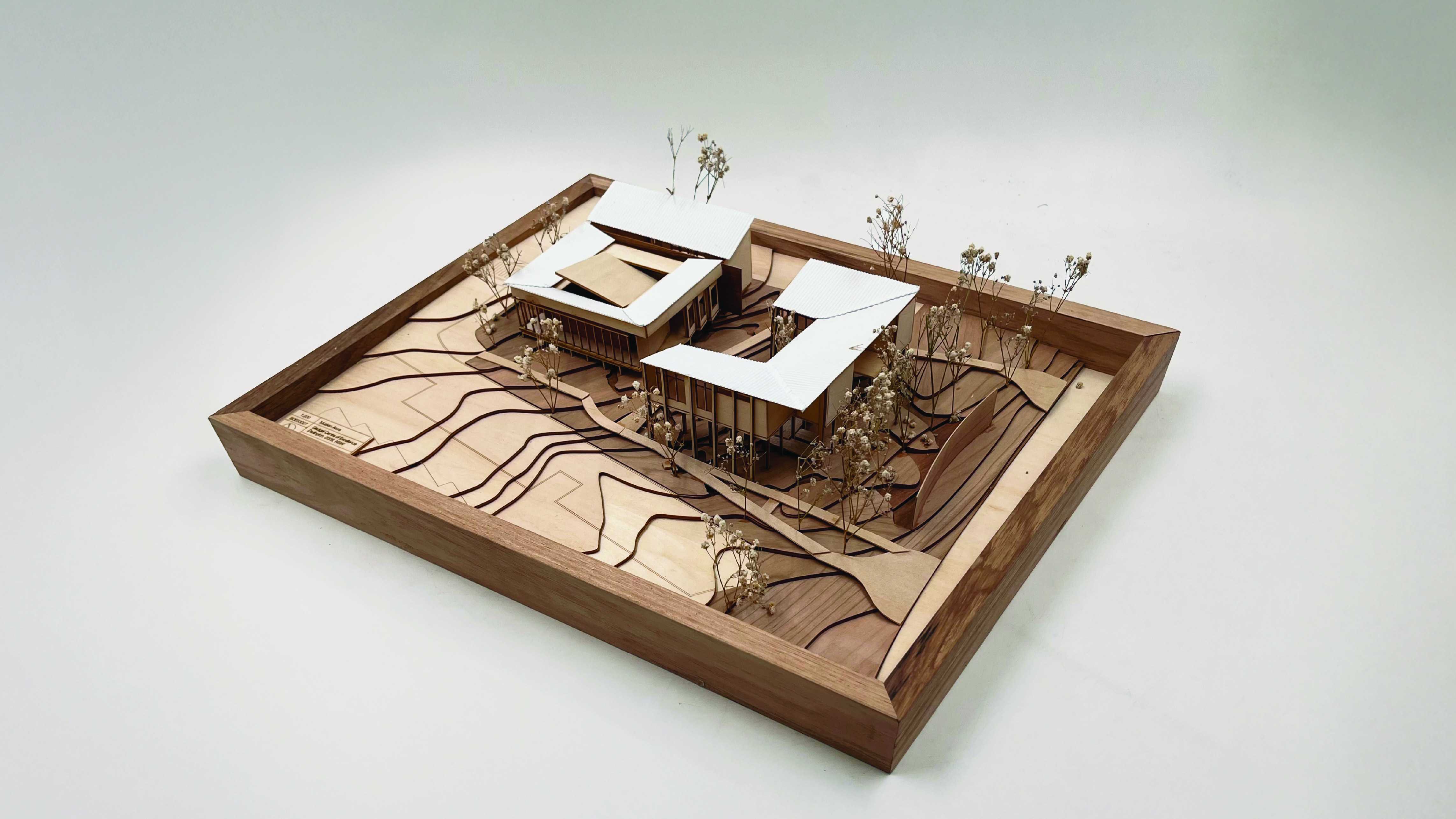 The proposal harnesses the slope of the site to centralise connection to Country through water ecologies. Water is allowed
 to permeate the functionality of spaces; a threshold between land and people. 